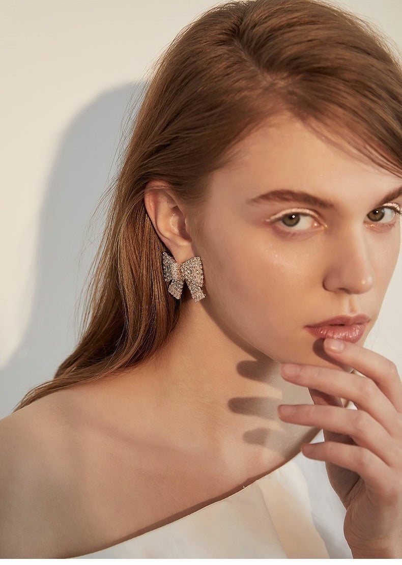 Golden Pearl Bow Stud Earrings