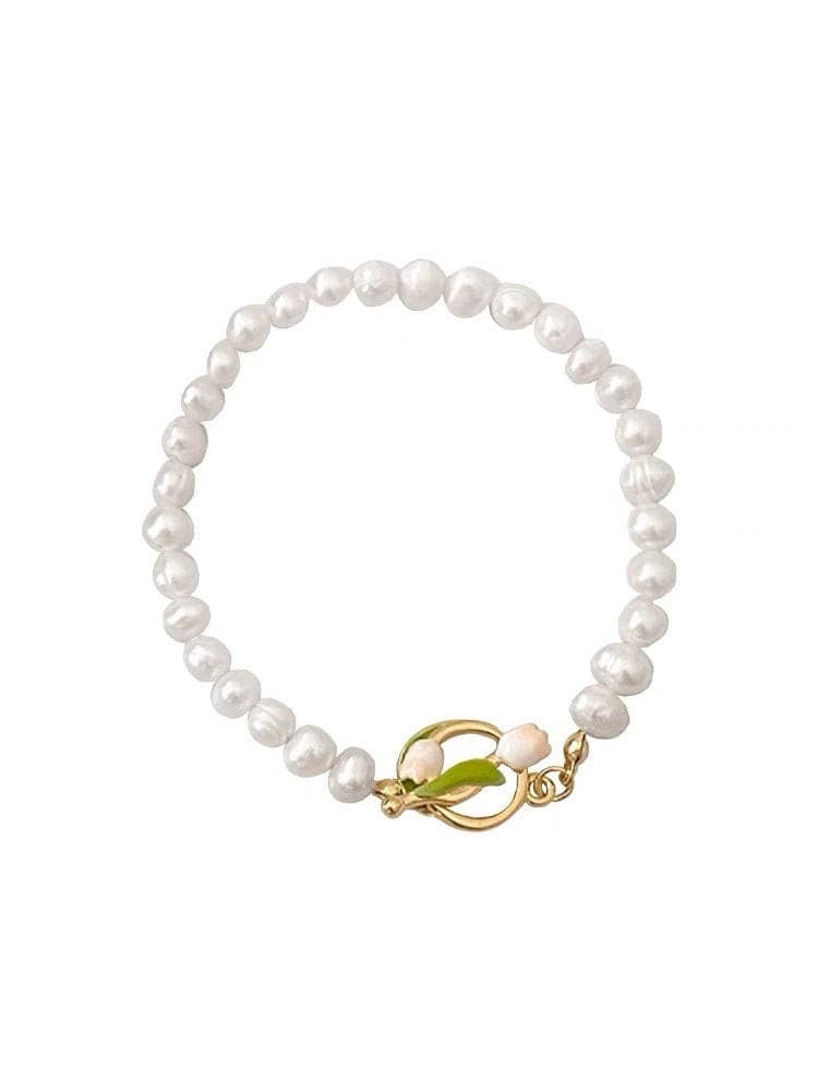 Floral Gold Embellished Pearl Bracelet.