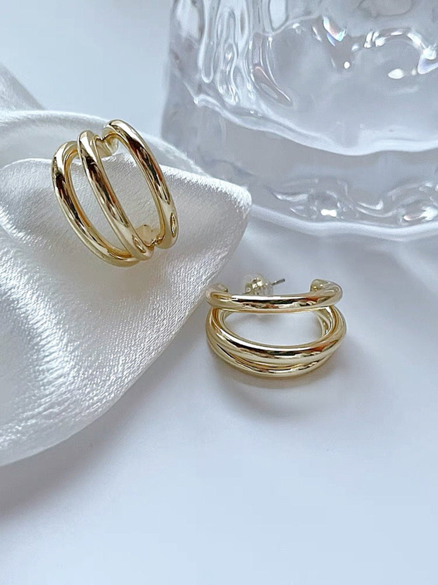 Triple Hoop Pave Gold Huggie Earrings.